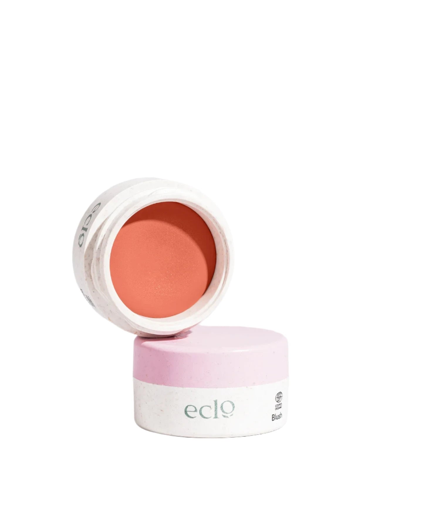 Eclo Blush in Corail Breeze offers a semi-solid formula enriched with vegetable wax for a smooth, seamless application. Available at www.vayuliving.com